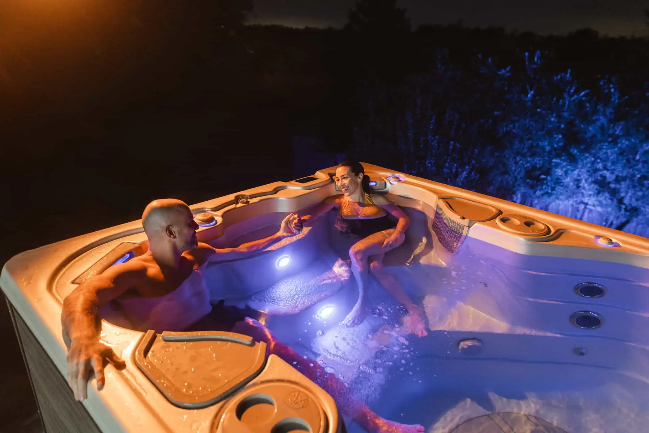 Couple enjoying in Hydropool Swim Spa
